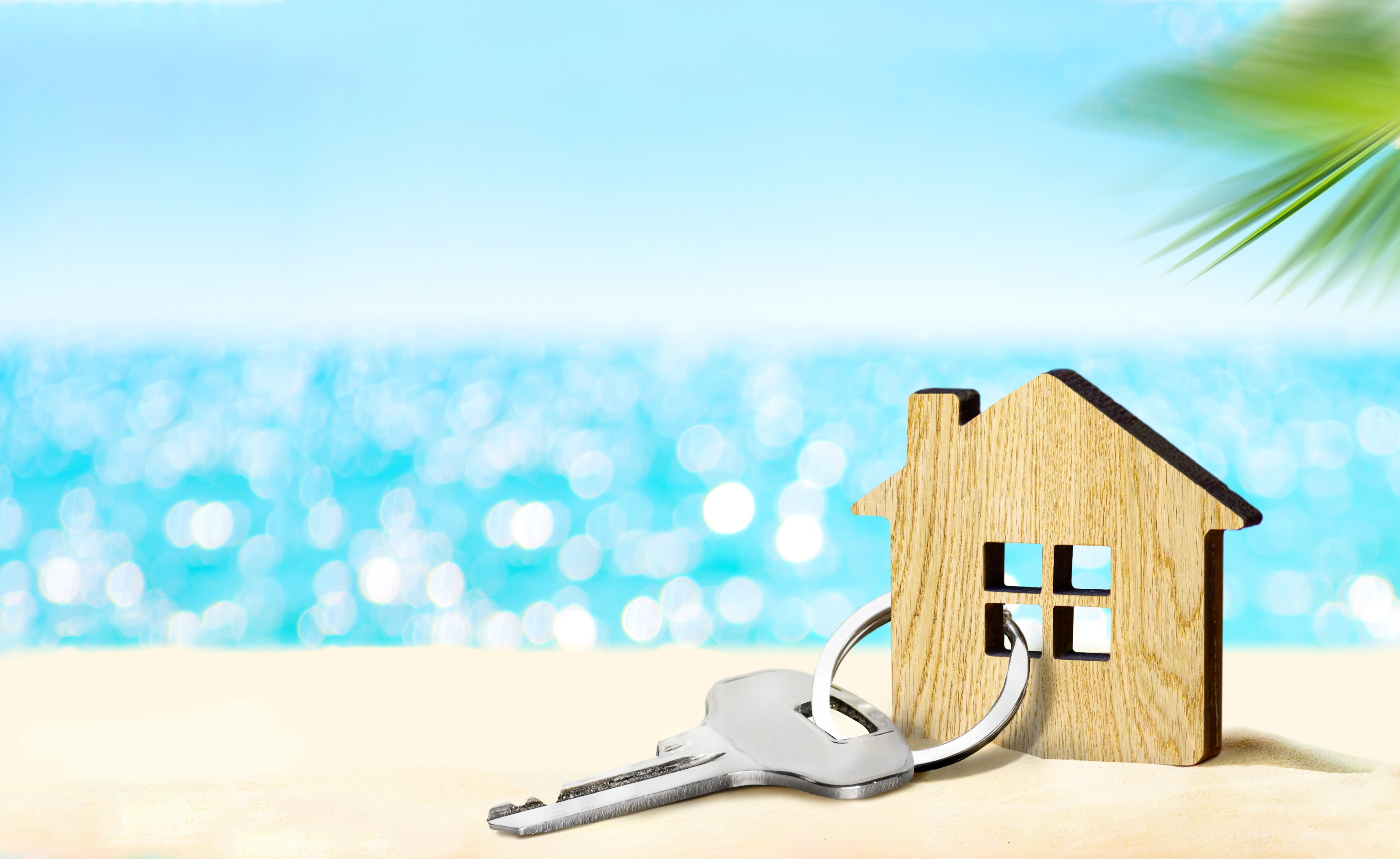 A house key ready for hand-over
